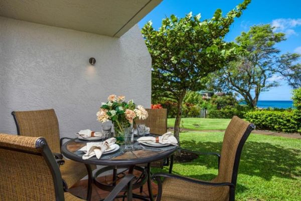 Golfer with Prosethetic Leg posing mid-swing with friend